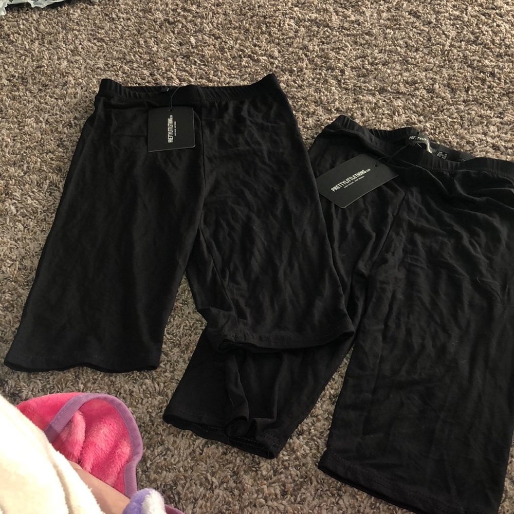 2 pair medium length bike shorts ( brand new )